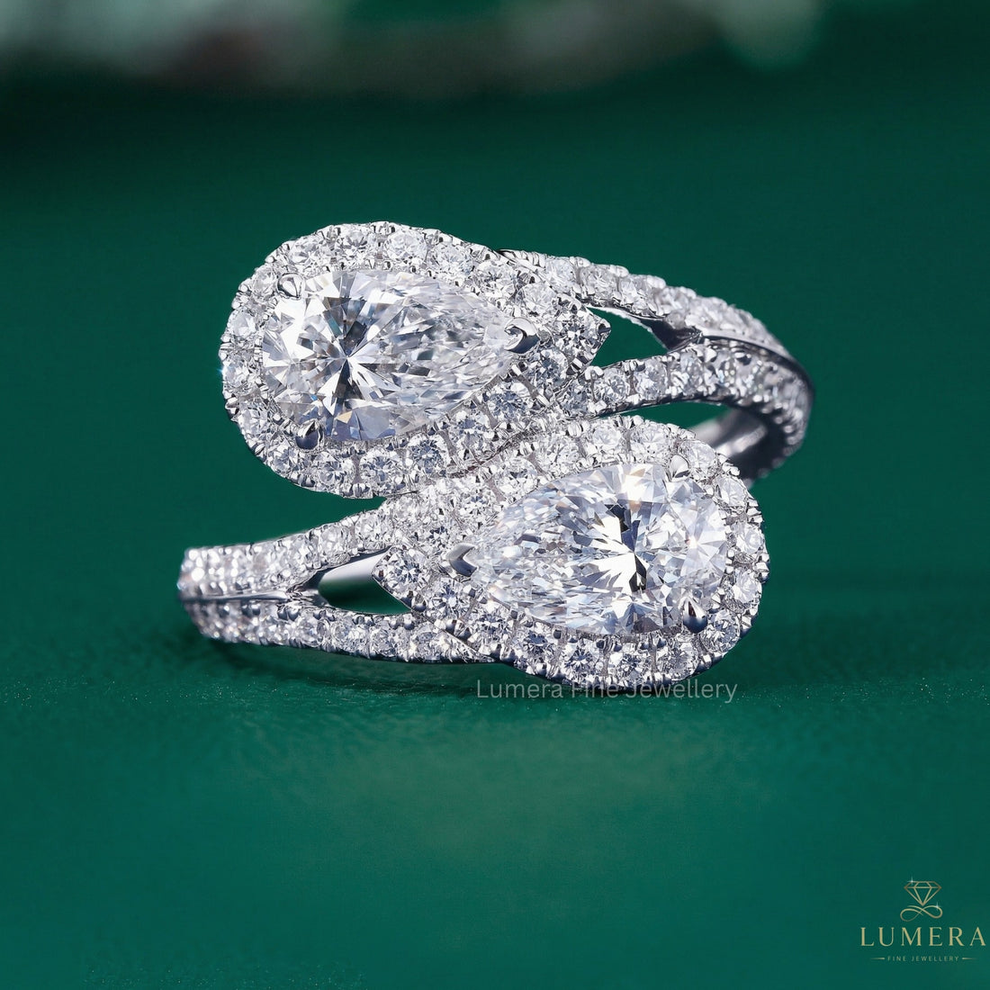 pear engagement ring with pear halo ring.