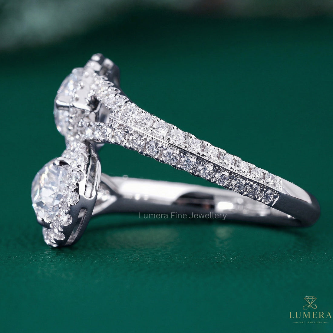 pear diamond ring with bypass style ring.