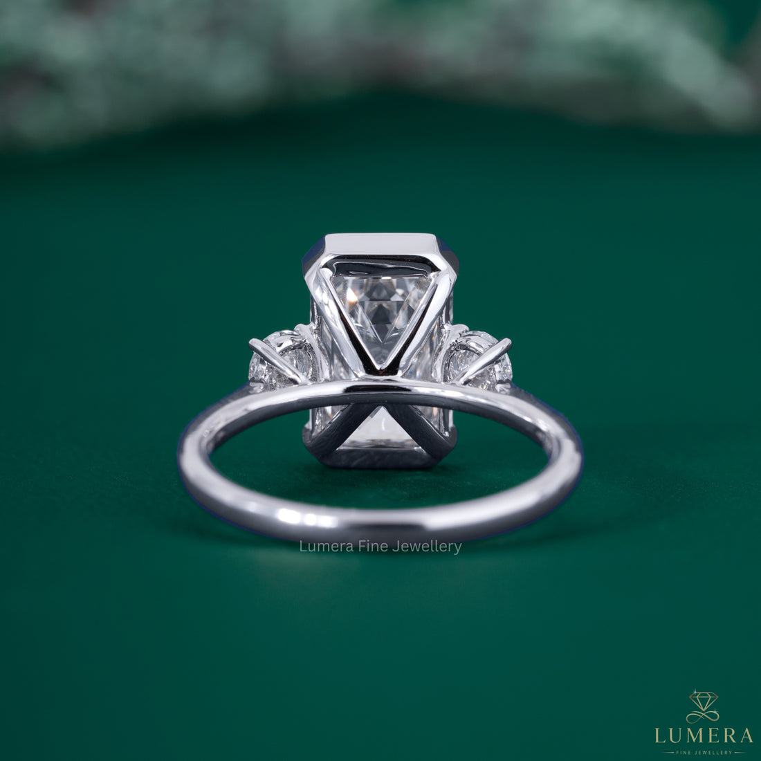 3 stones diamond ring with tapered shank ring.
