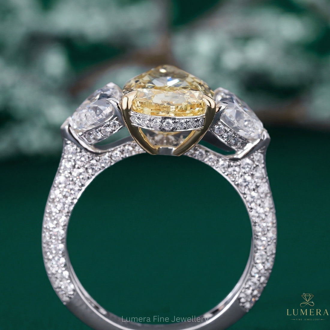 pear diamond ring with 3 stone engagement ring.