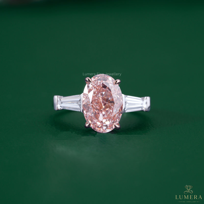 Basket diamond engagement ring featuring a pink oval diamond ring.