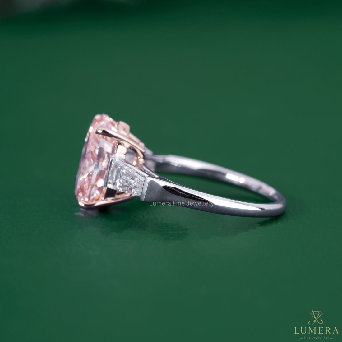 Basket setting ring paired with a vivid pink diamond engagement ring.