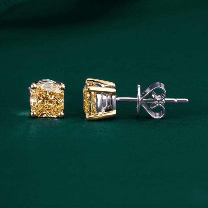 yellow diamond earrings with yellow cushion earrings.
