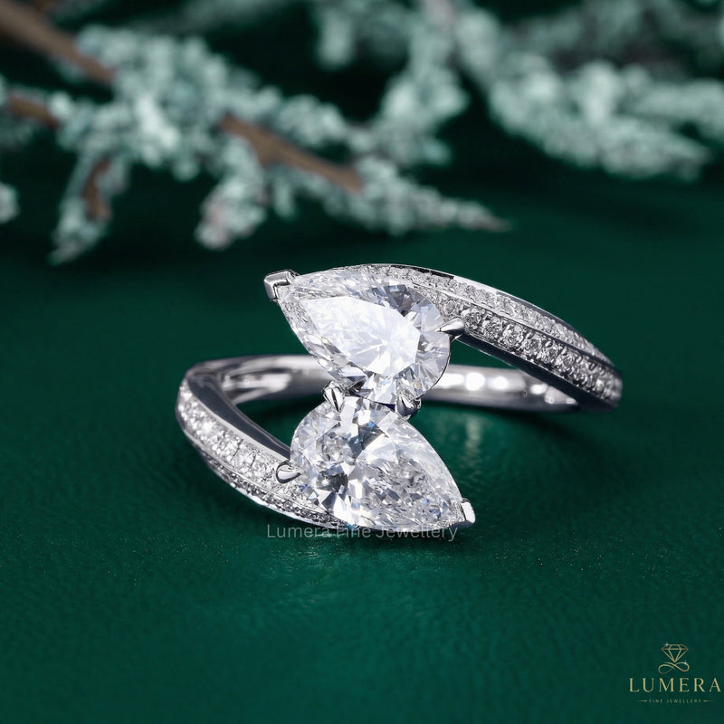 pear diamond ring with toi et moi ring.