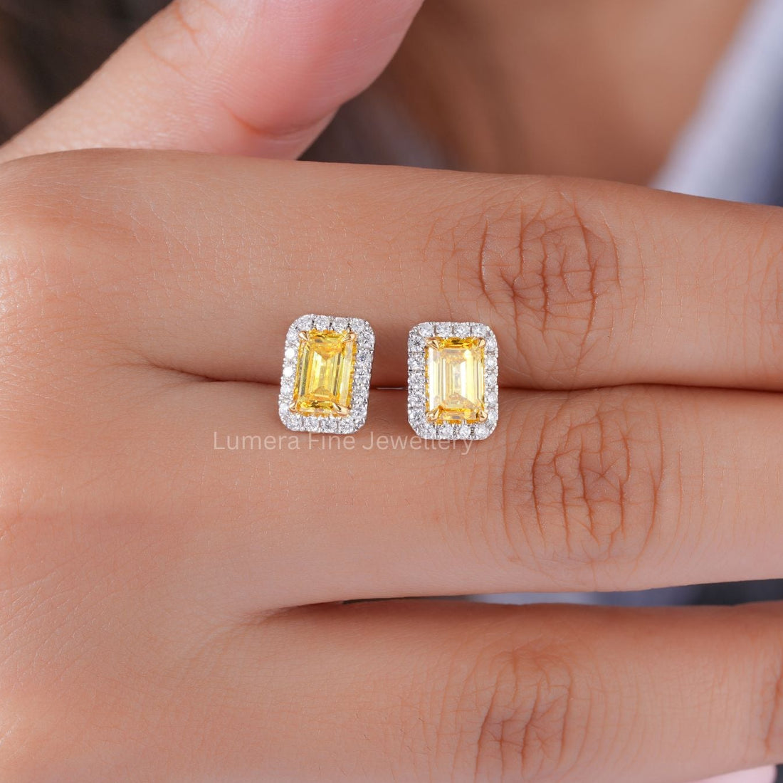 lab grown diamond with solid gold earrings.
