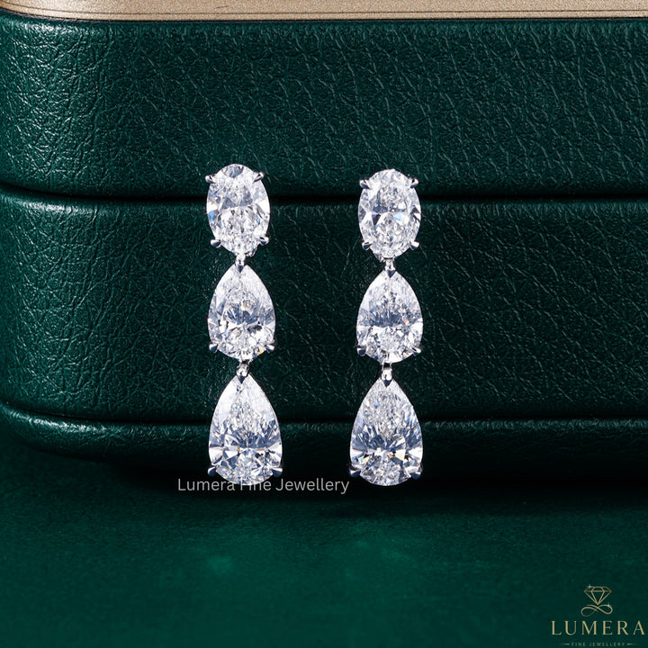 4.80 TCW Pear and Oval Cut Lab Grown Diamond Dangle Earrings