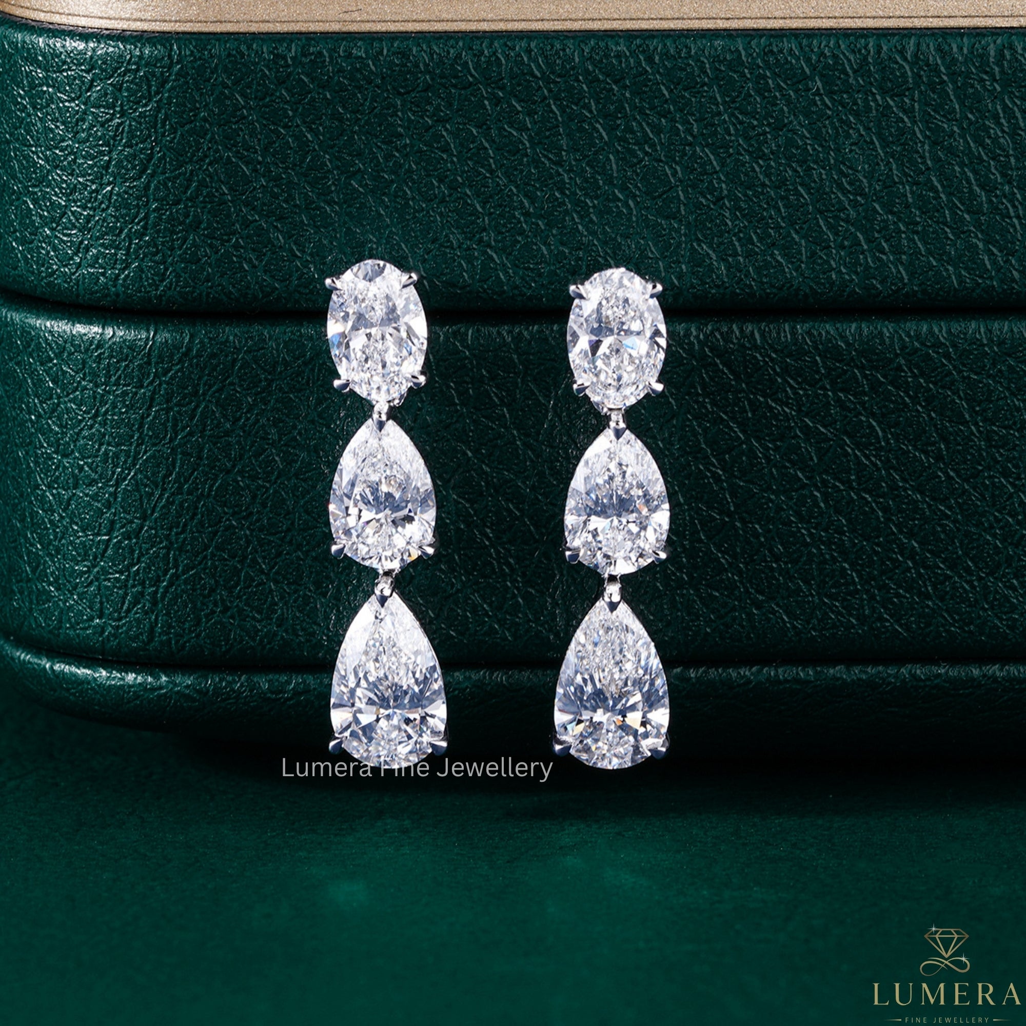 pear shaped earrings with solid gold earrings.