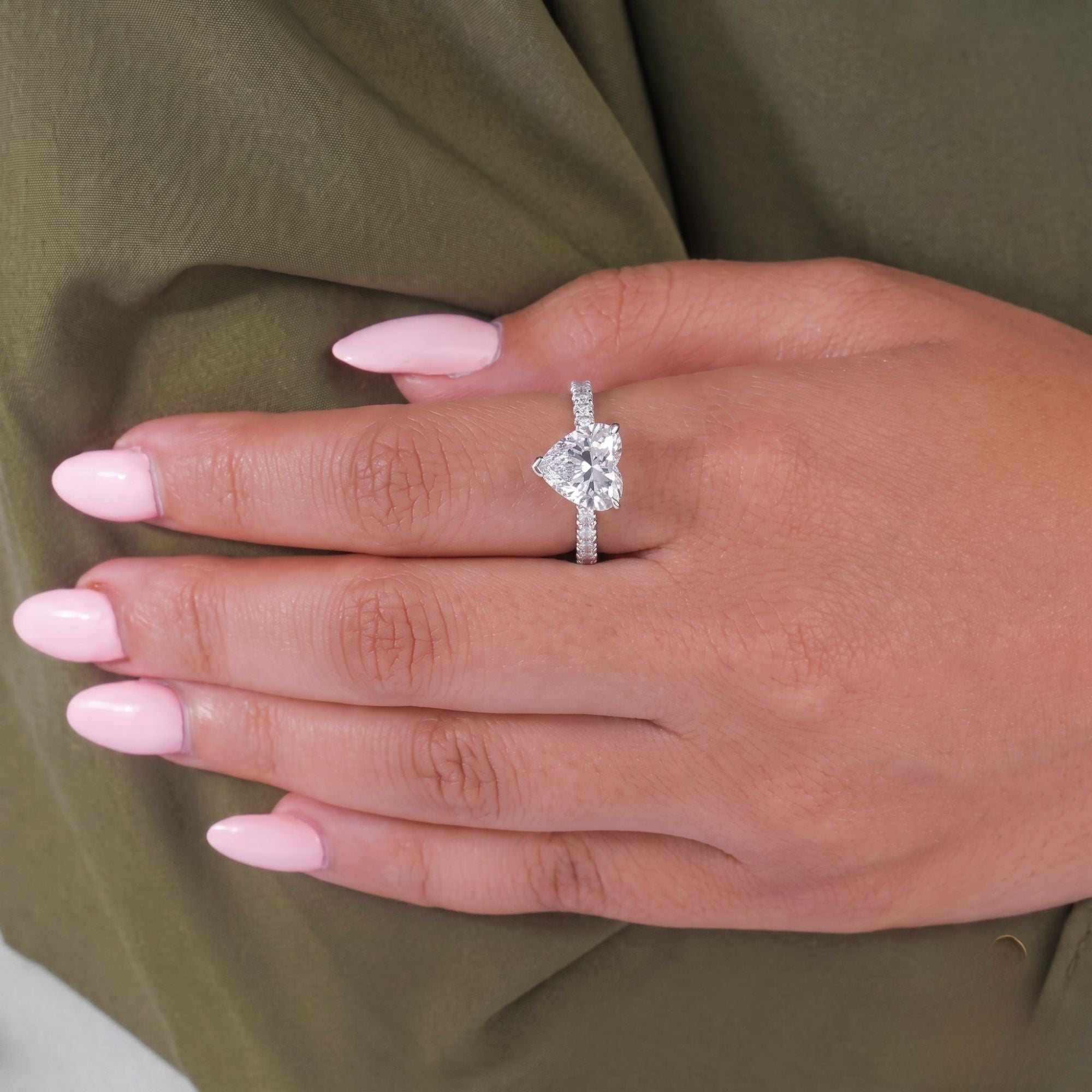 Heart cut diamond ring with 2 prong ring.
