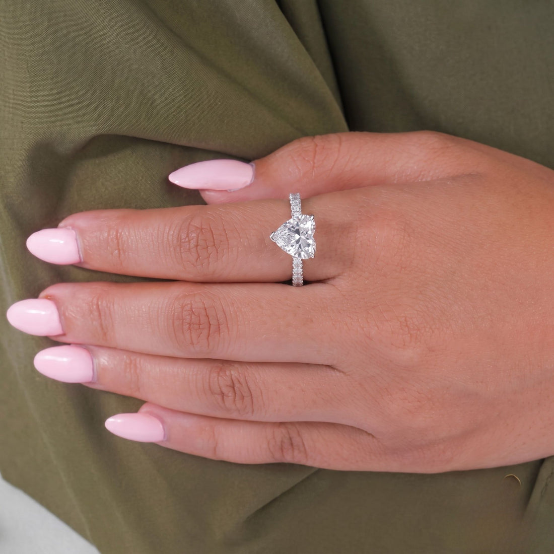 Heart cut diamond ring with 2 prong ring.
