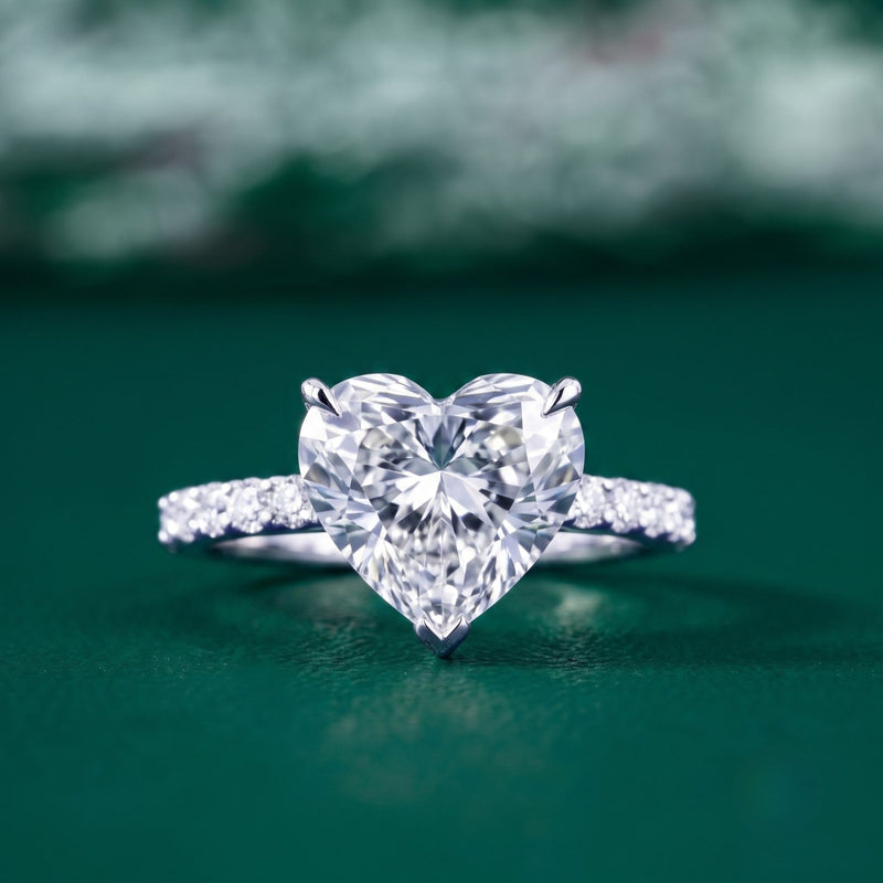 Heart cut engagement ring with V prong ring.
