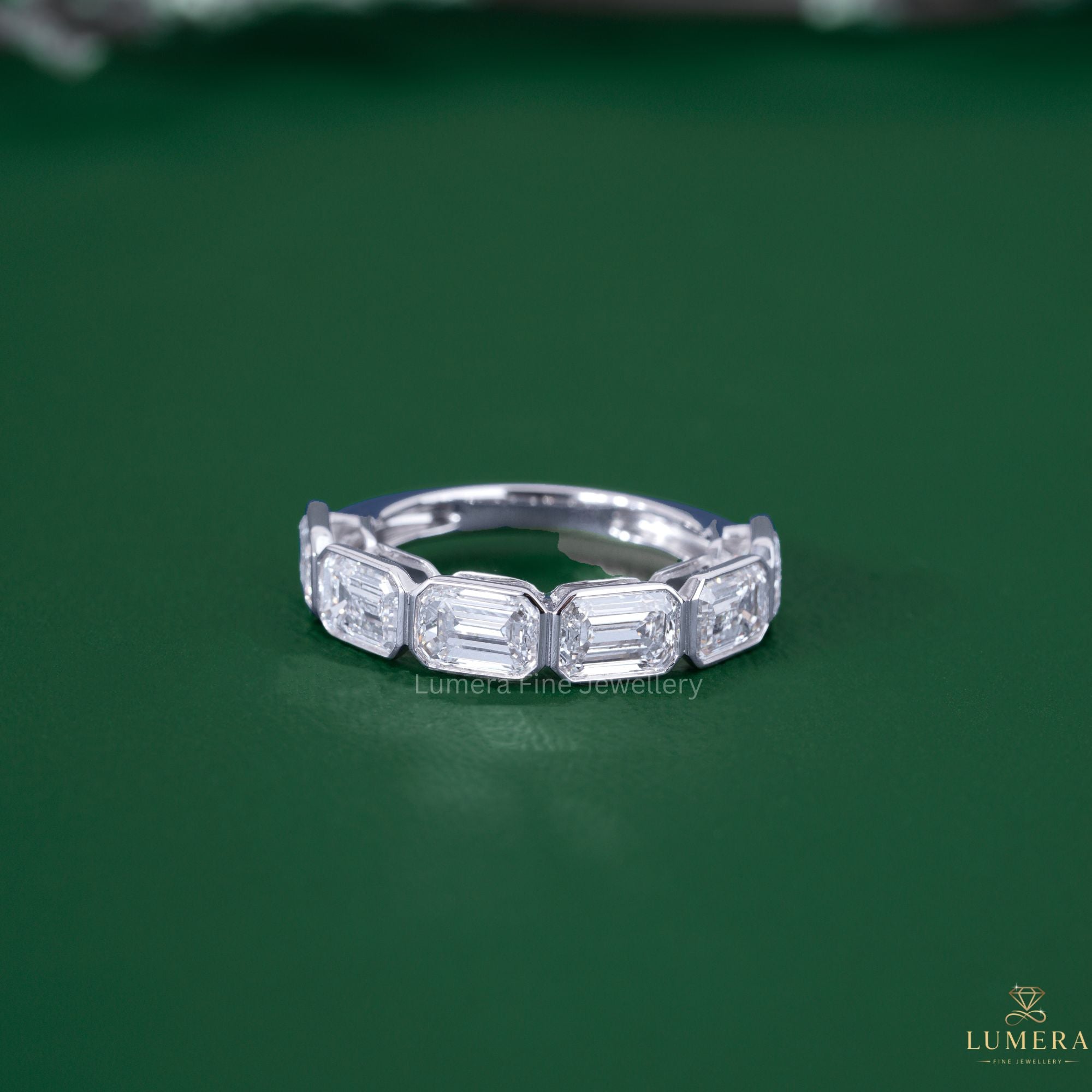 Half eternity band with bezel setting band.