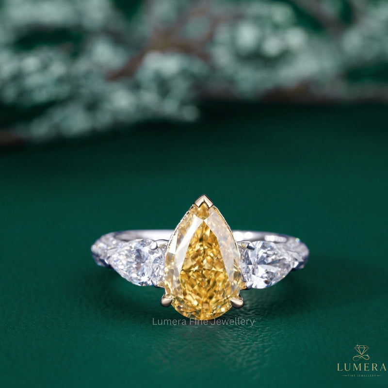 Pear Shaped Yellow Diamond Ring In Multi Row Pave Setting