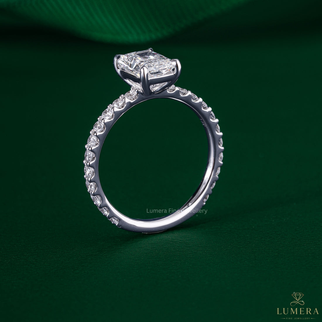 Radiant cut engagement ring paired with a stackable pave setting.