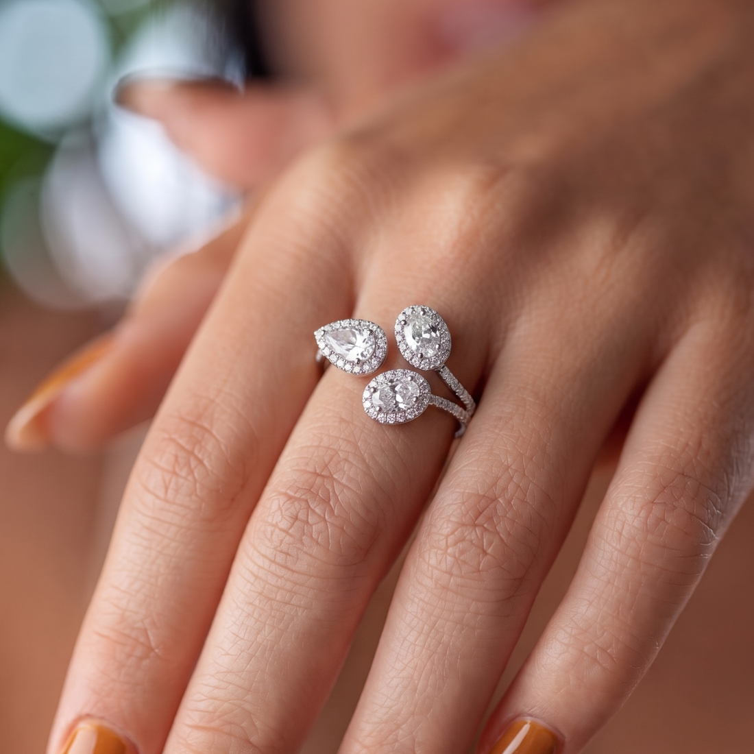 oval diamond ring with oval and pear engagement ring.
