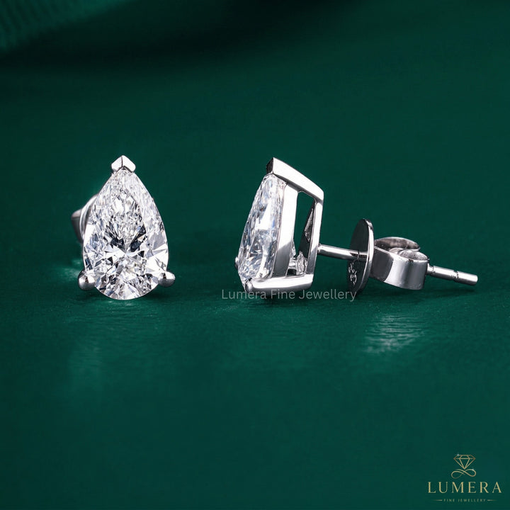 stud diamond earrings with push back earrings.
