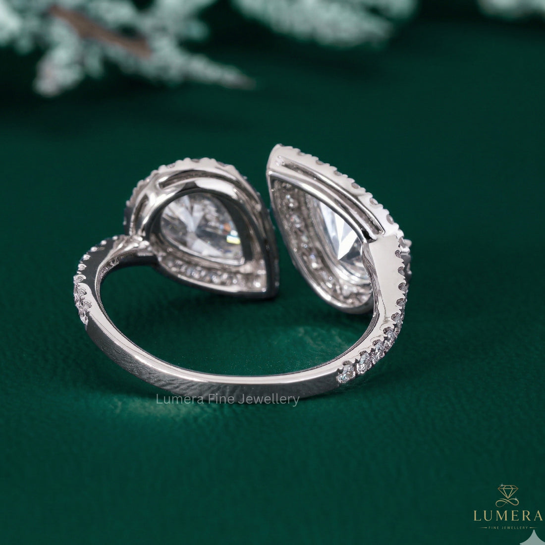 pear engagement ring with pear halo ring.
