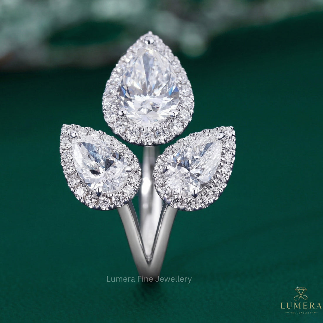 pear cut halo ring with halo diamond ring.
