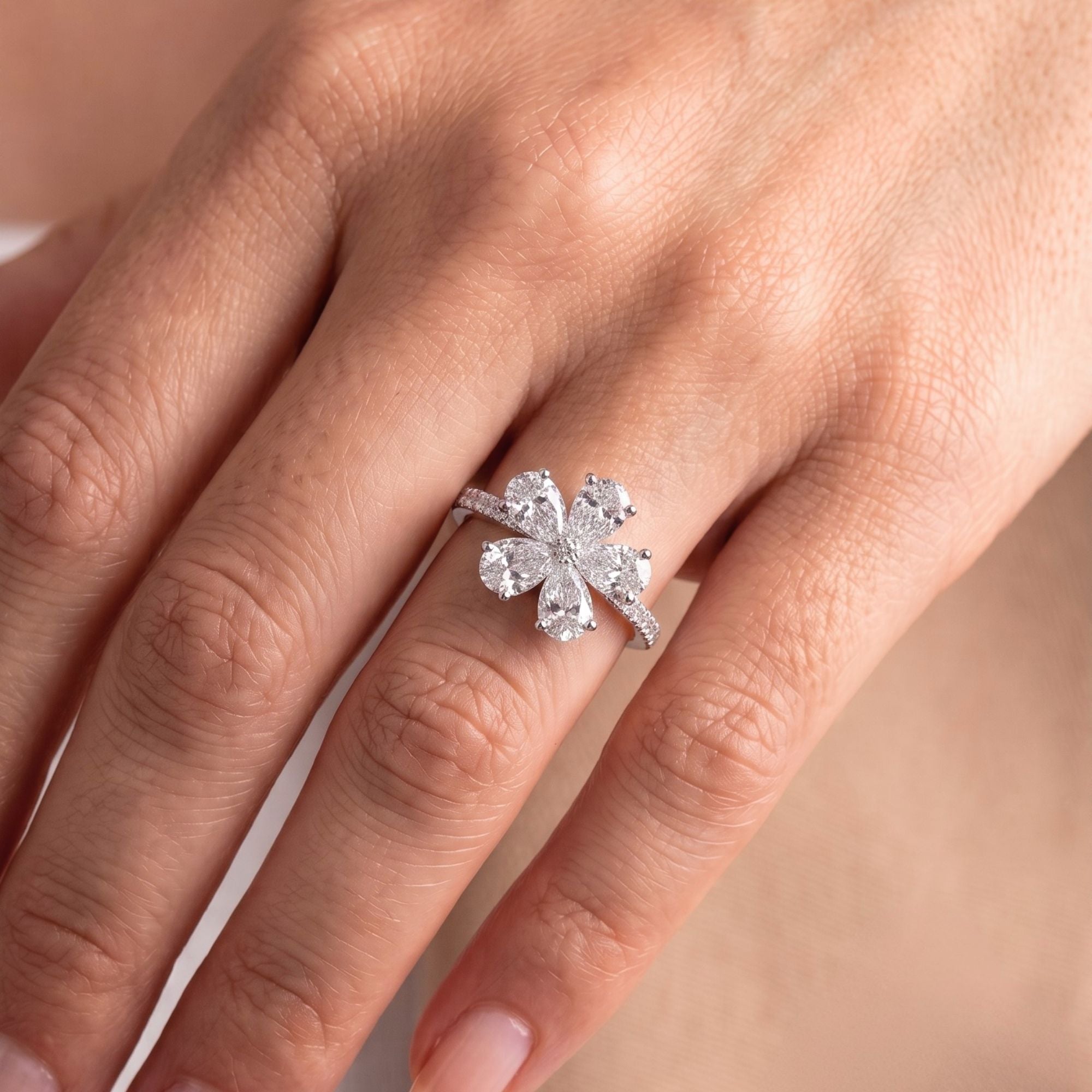 pave engagement ring with round prong setting.

