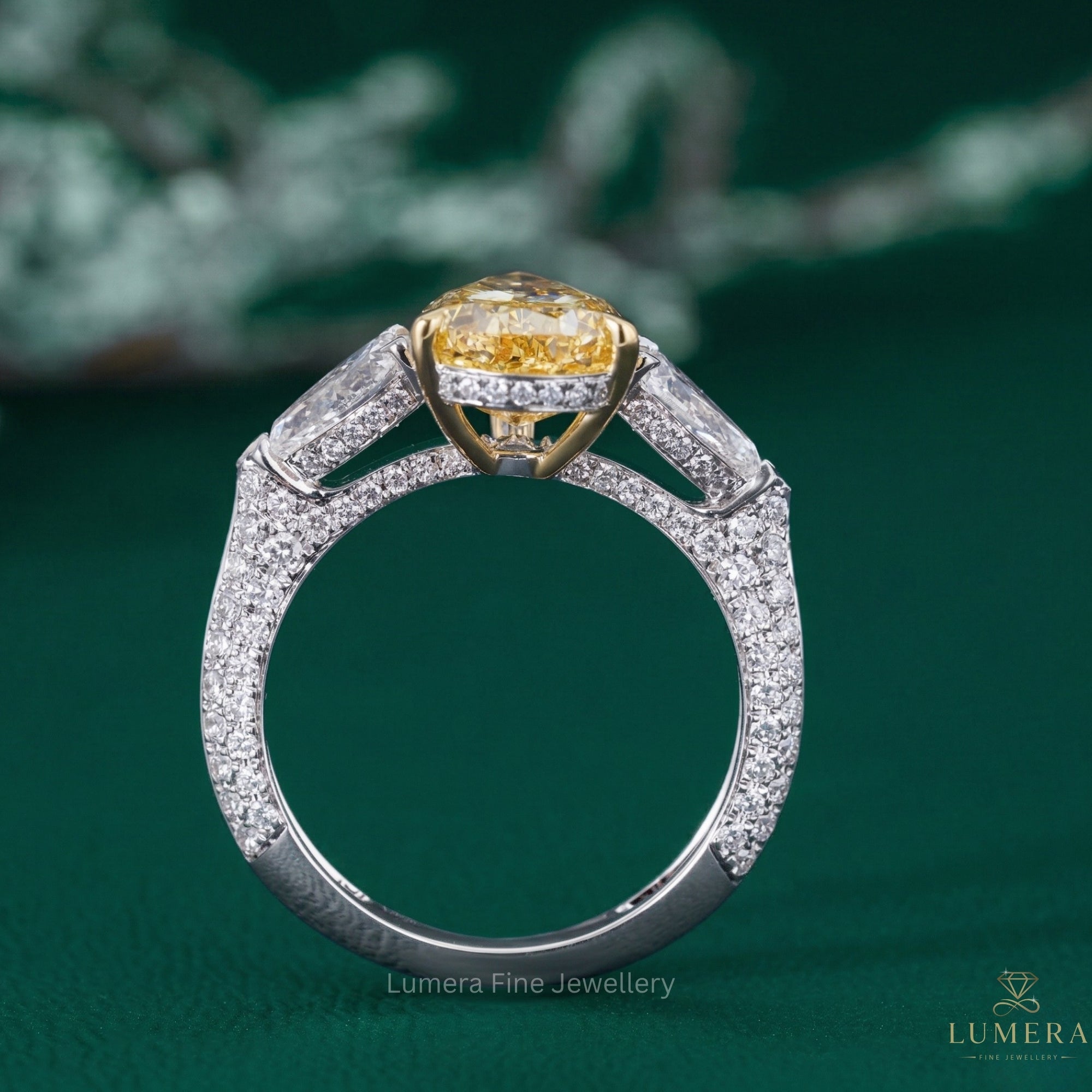 yellow pear diamond ring with hidden halo engagement ring.