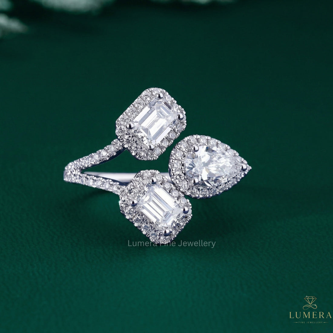 Pear Emerald Diamond Ring with emerald engagement ring.