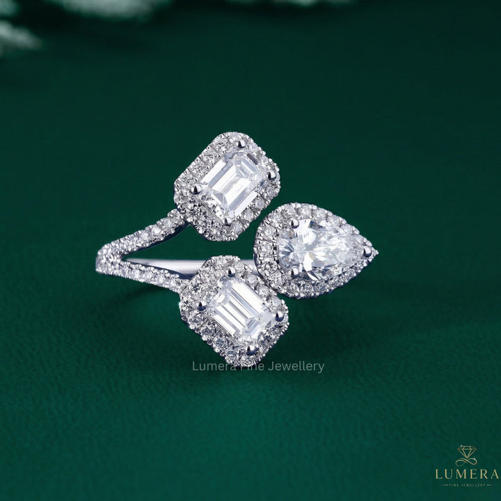 Pear Emerald Diamond Ring with emerald engagement ring.