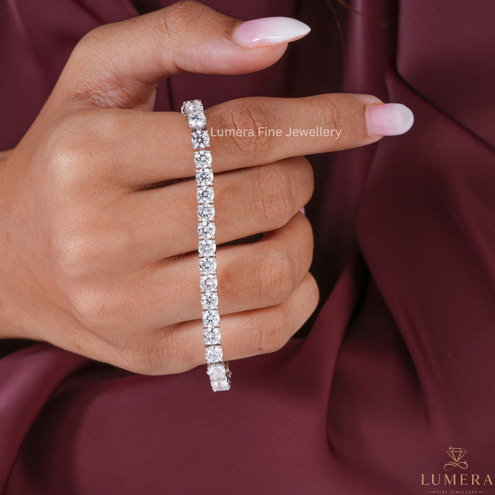 round diamond tennis bracelet with lab diamond tennis bracelet.