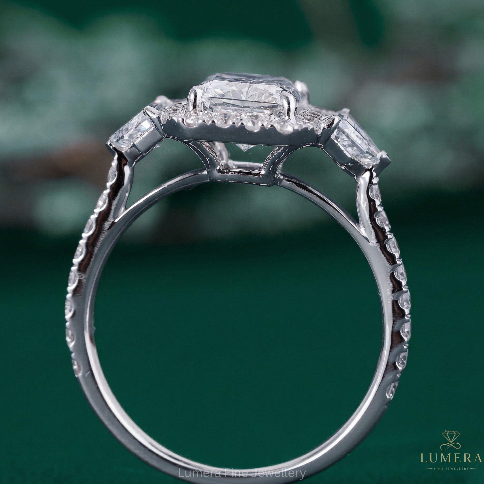 radiant diamond ring with three stone engagement ring.