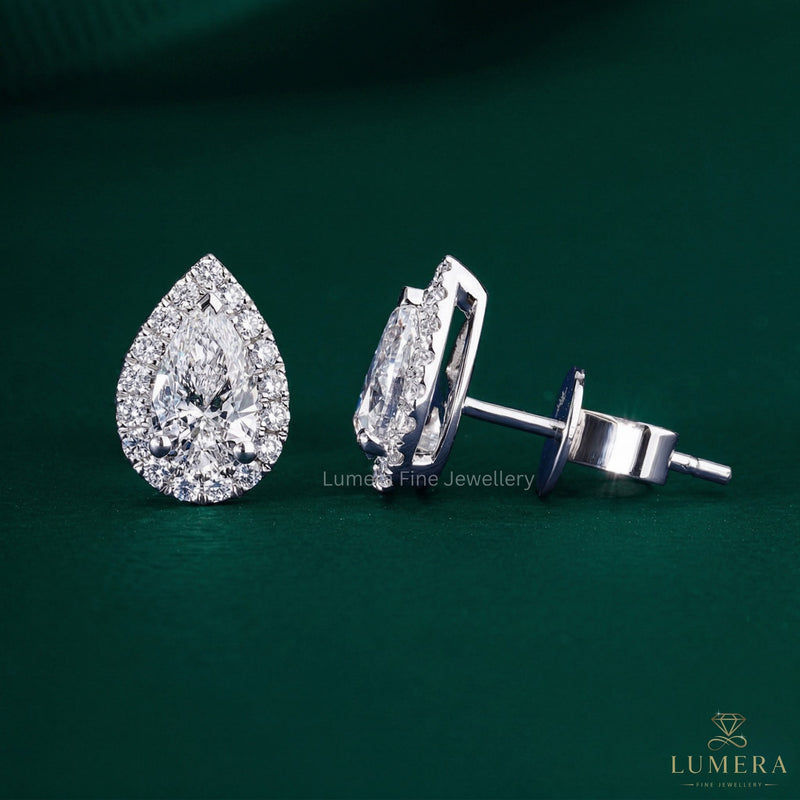 Pear Shape Diamond Earrings with halo set earrings.
