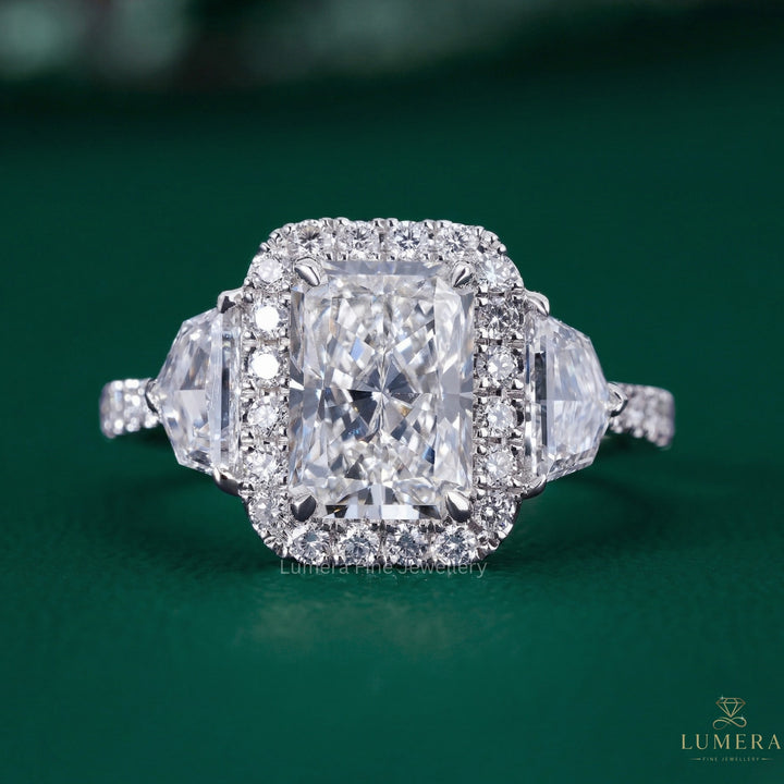 radiant engagement ring with Cadillac side stones.