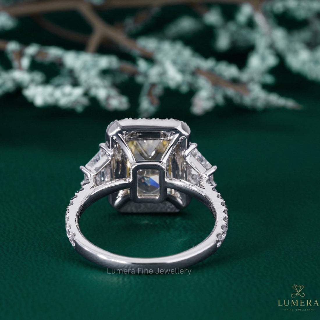 three stone ring with radiant trapezoid stone ring.