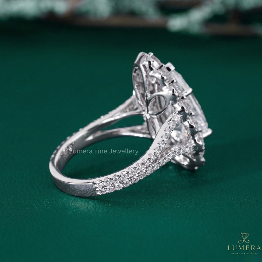 pear diamond engagement ring with double halo diamond ring.