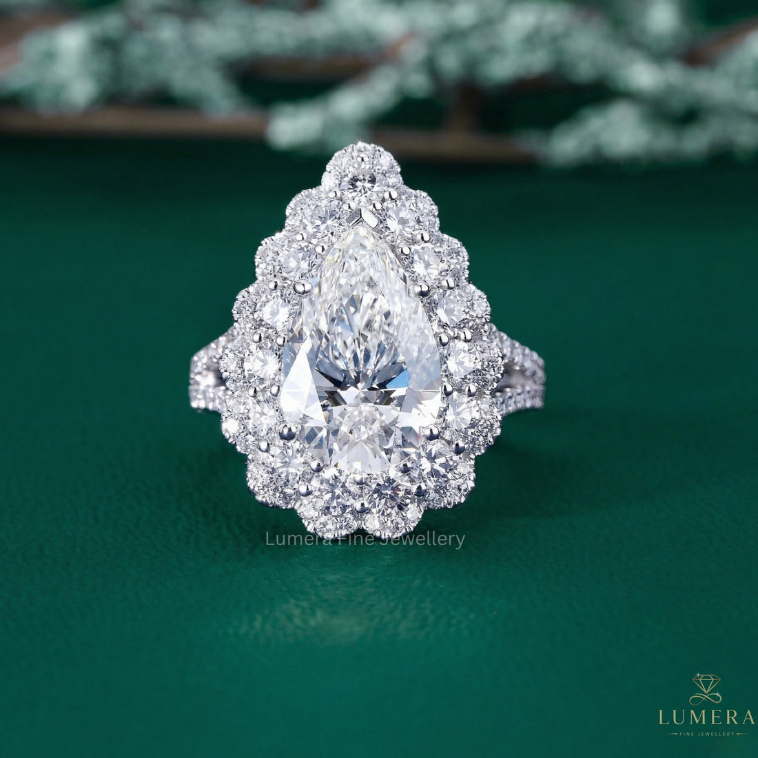 pear shaped engagement ring with almond engagement ring.