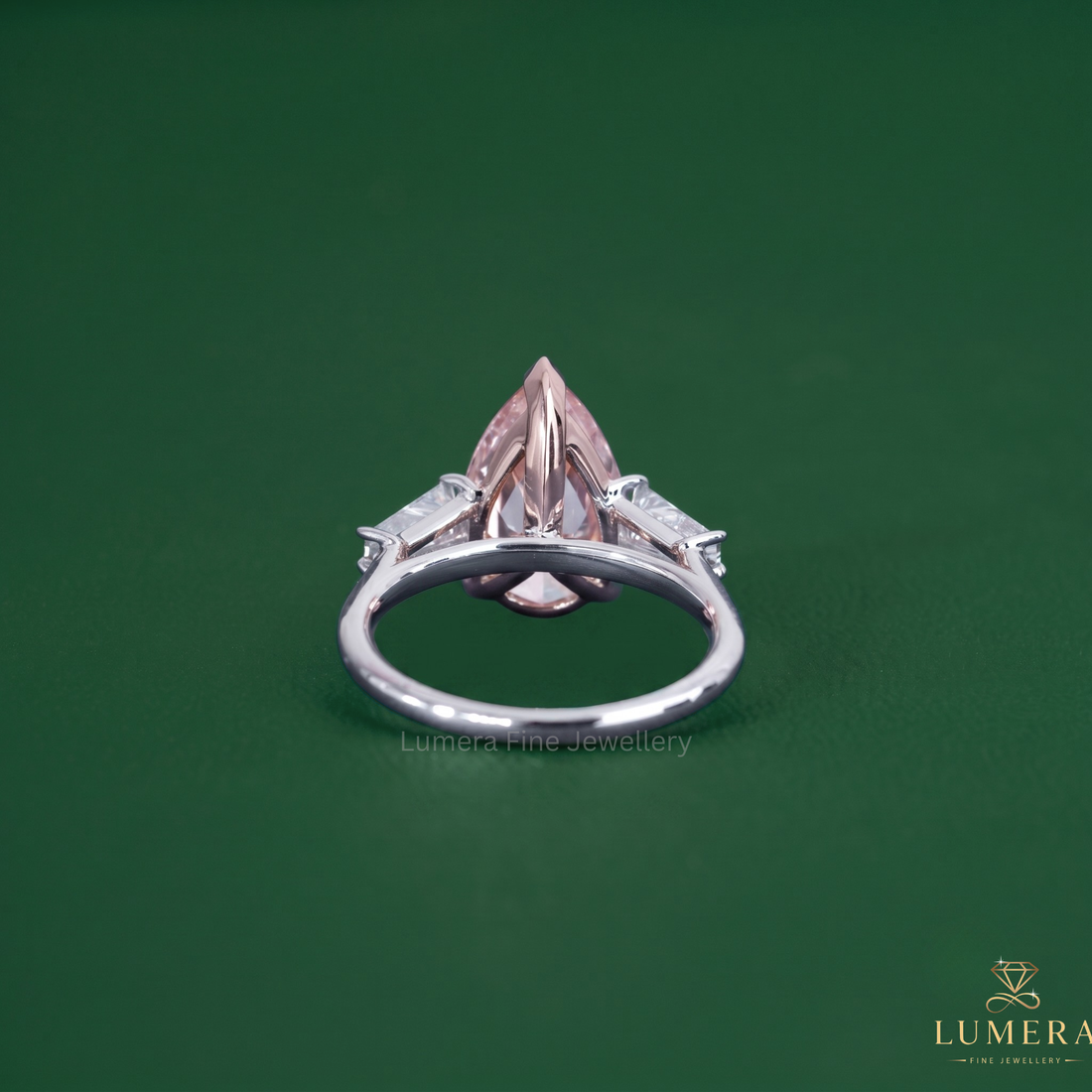 Three diamond ring featuring an almond diamond ring.