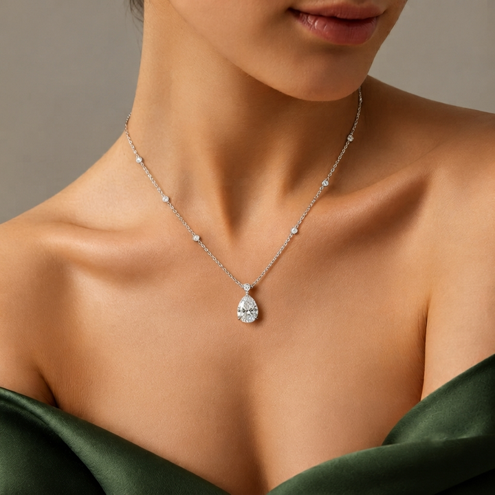 pear shape diamond pendant with V prong setting.
