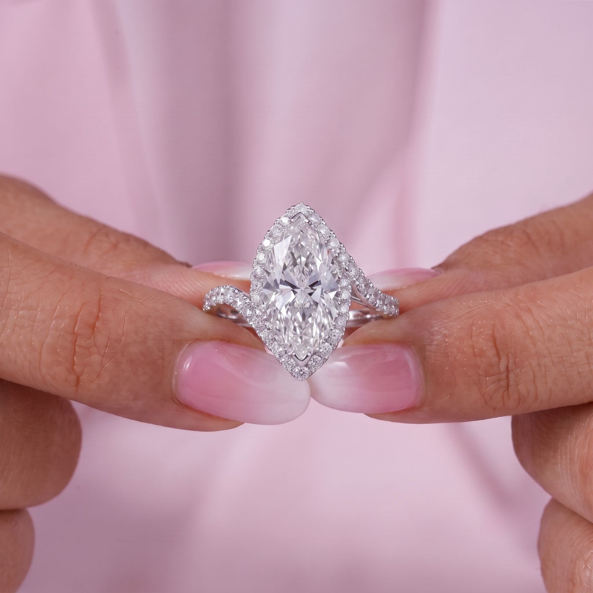 pave ring with V prong pave setting.
