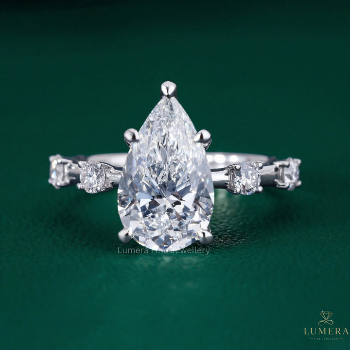 pear engagement ring with aesthetic pear diamond ring.