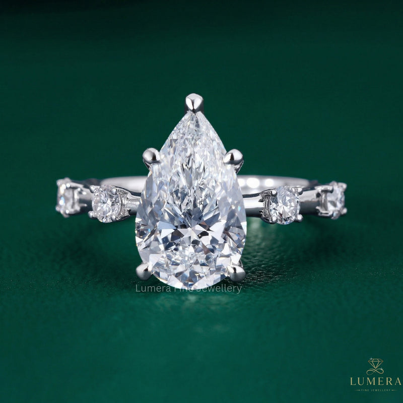 pear engagement ring with aesthetic pear diamond ring.