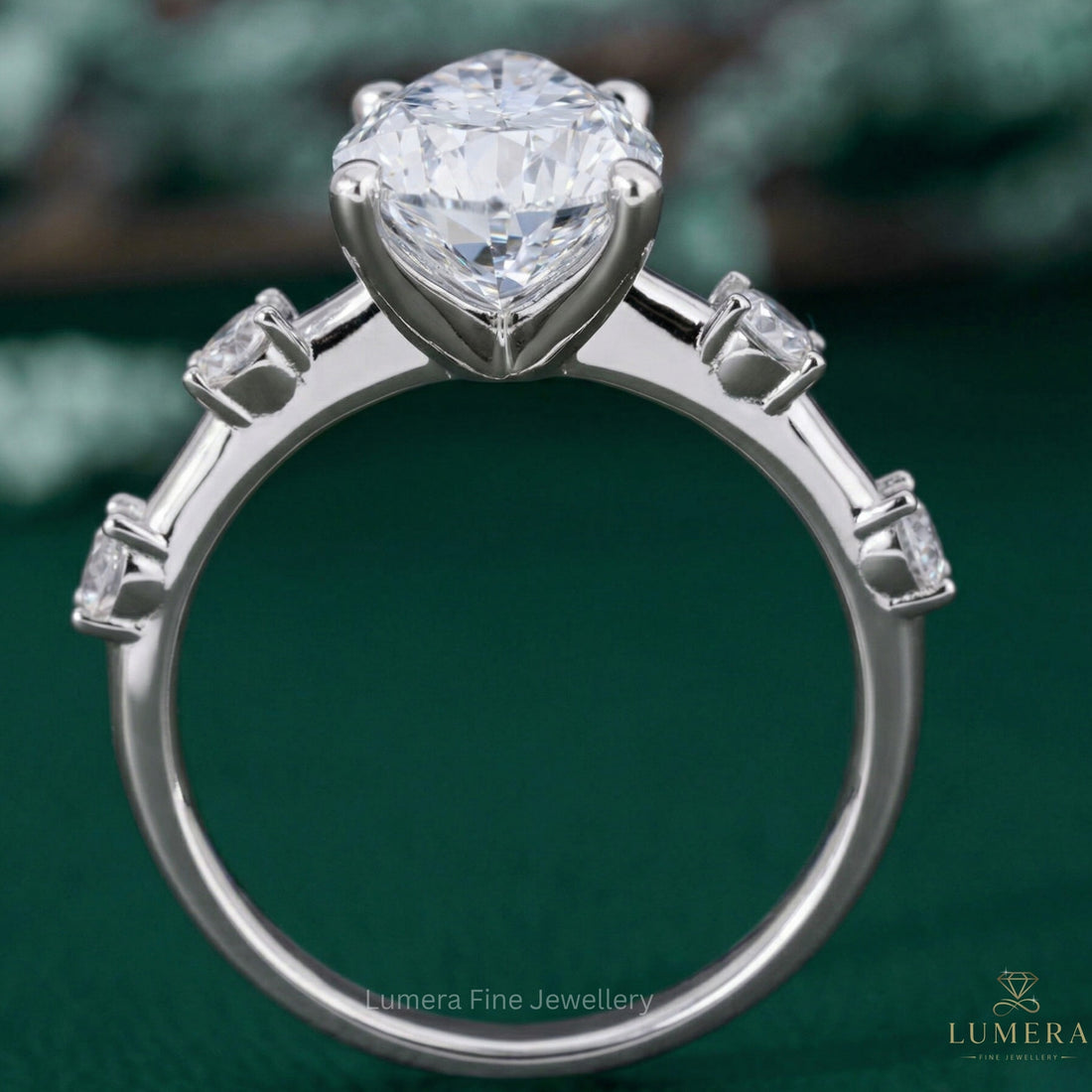 pear shaped halo engagement ring with almond engagement ring.