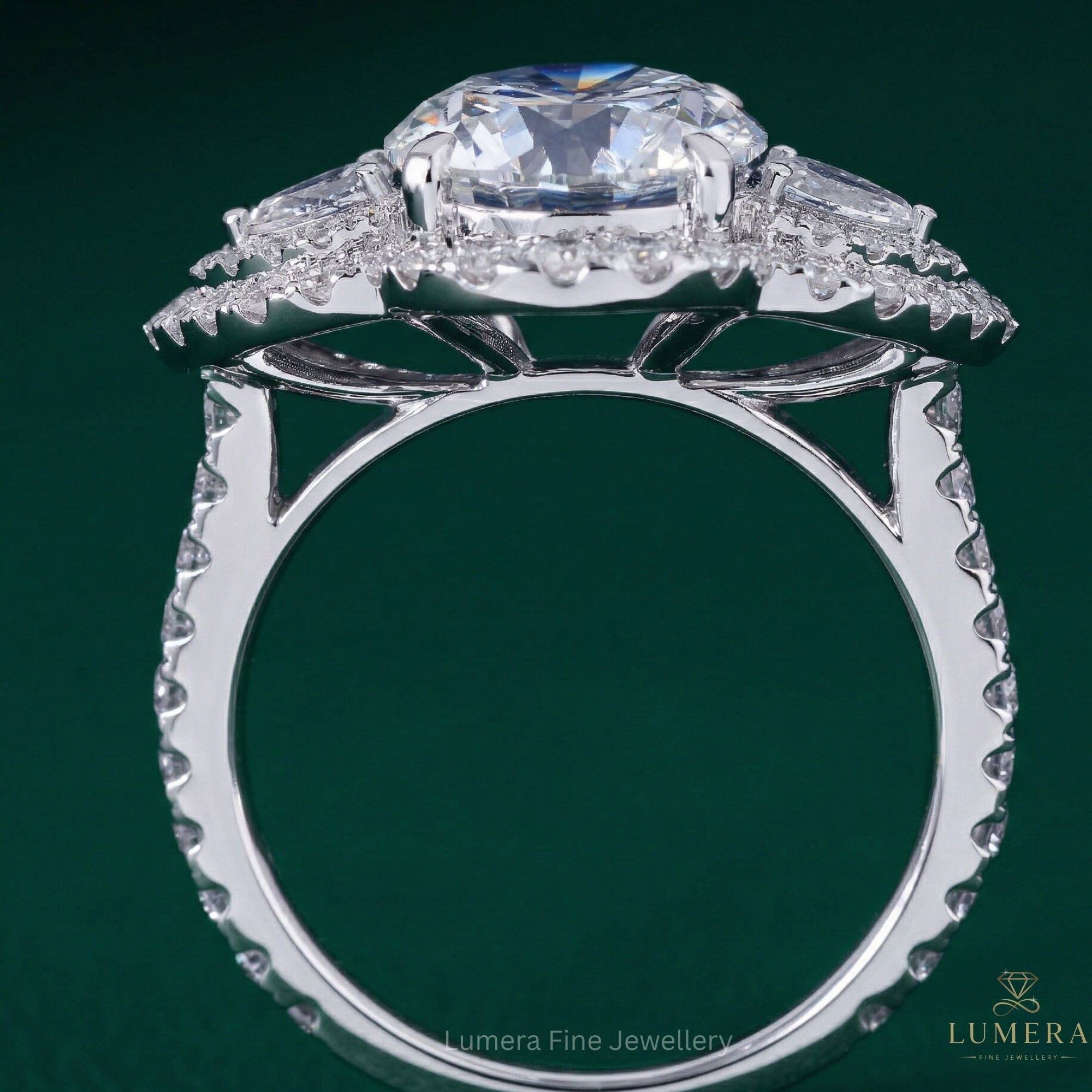 round diamond engagement ring with three stone engagement ring.