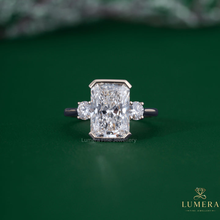 Radiant cut ring with radiant diamond engagement ring.