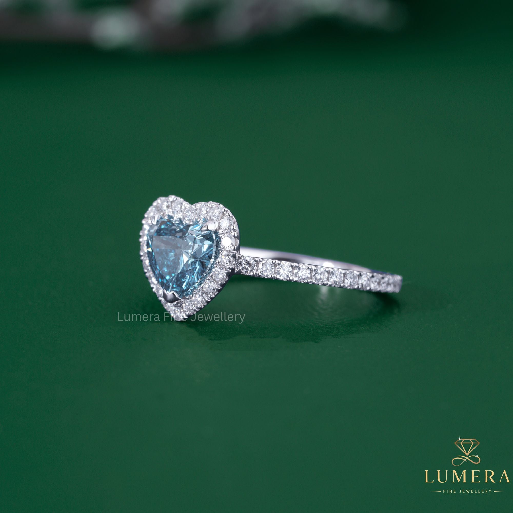 Blue diamond engagement ring with blue diamond ring.