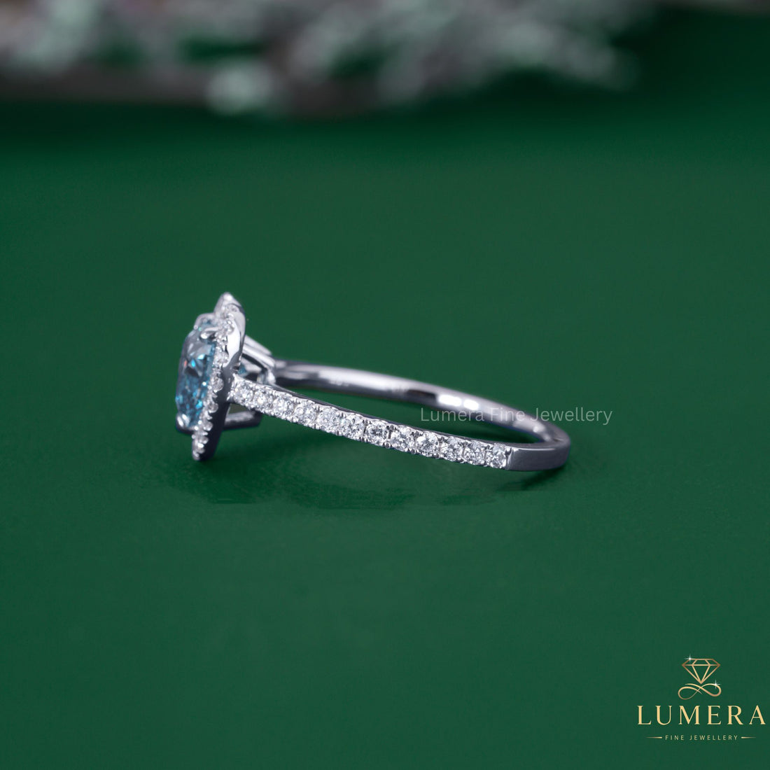Halo engagement ring with halo setting ring.
