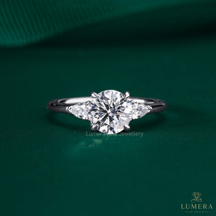 elongated cushion cut engagement ring with hidden halo ring.