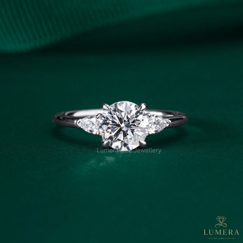 elongated cushion cut engagement ring with hidden halo ring.