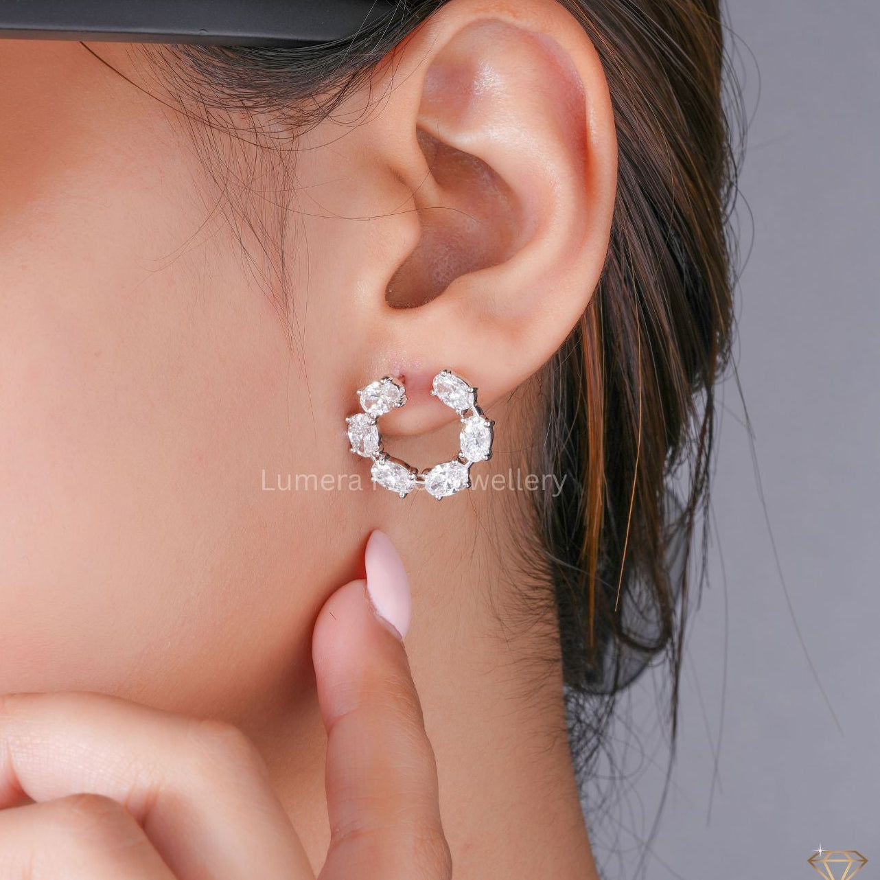 oval diamond earrings with solid gold stud earrings.
