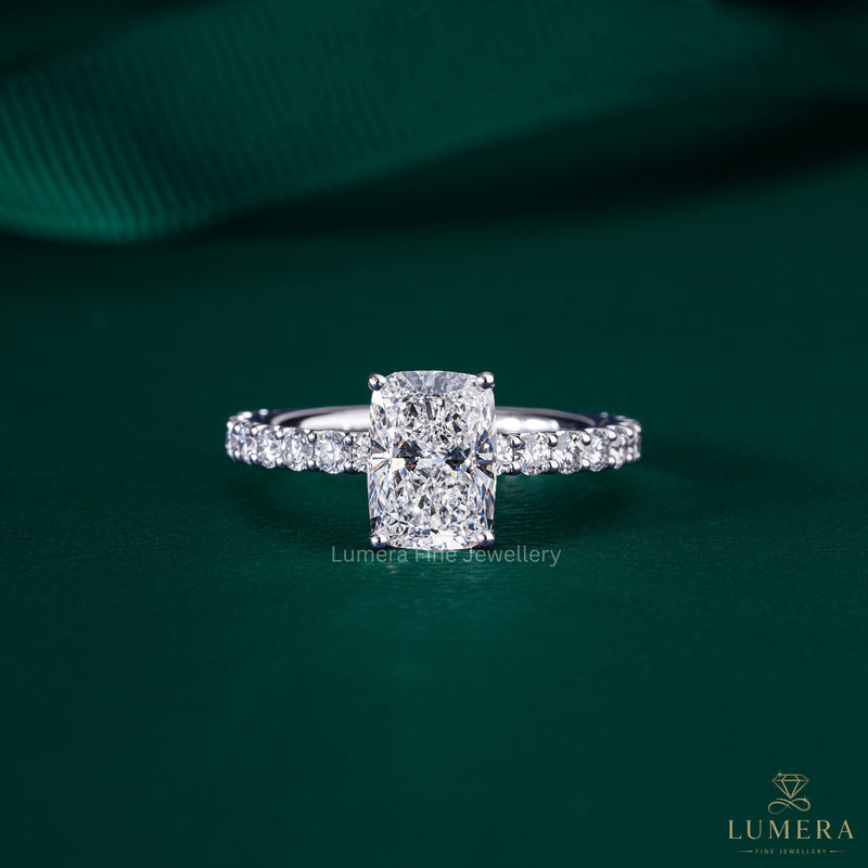elongated cushion cut engagement ring with u prong setting.
