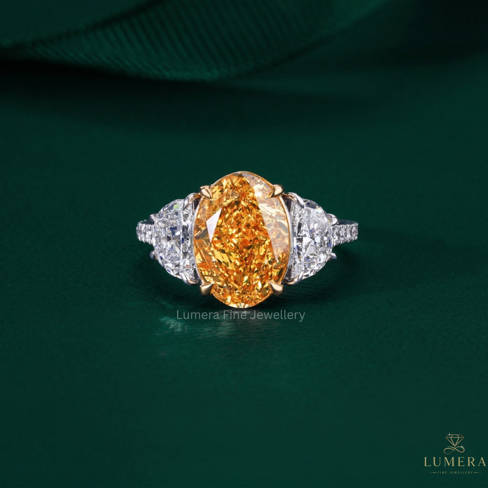 oval diamond engagement ring with yellow diamond ring.
