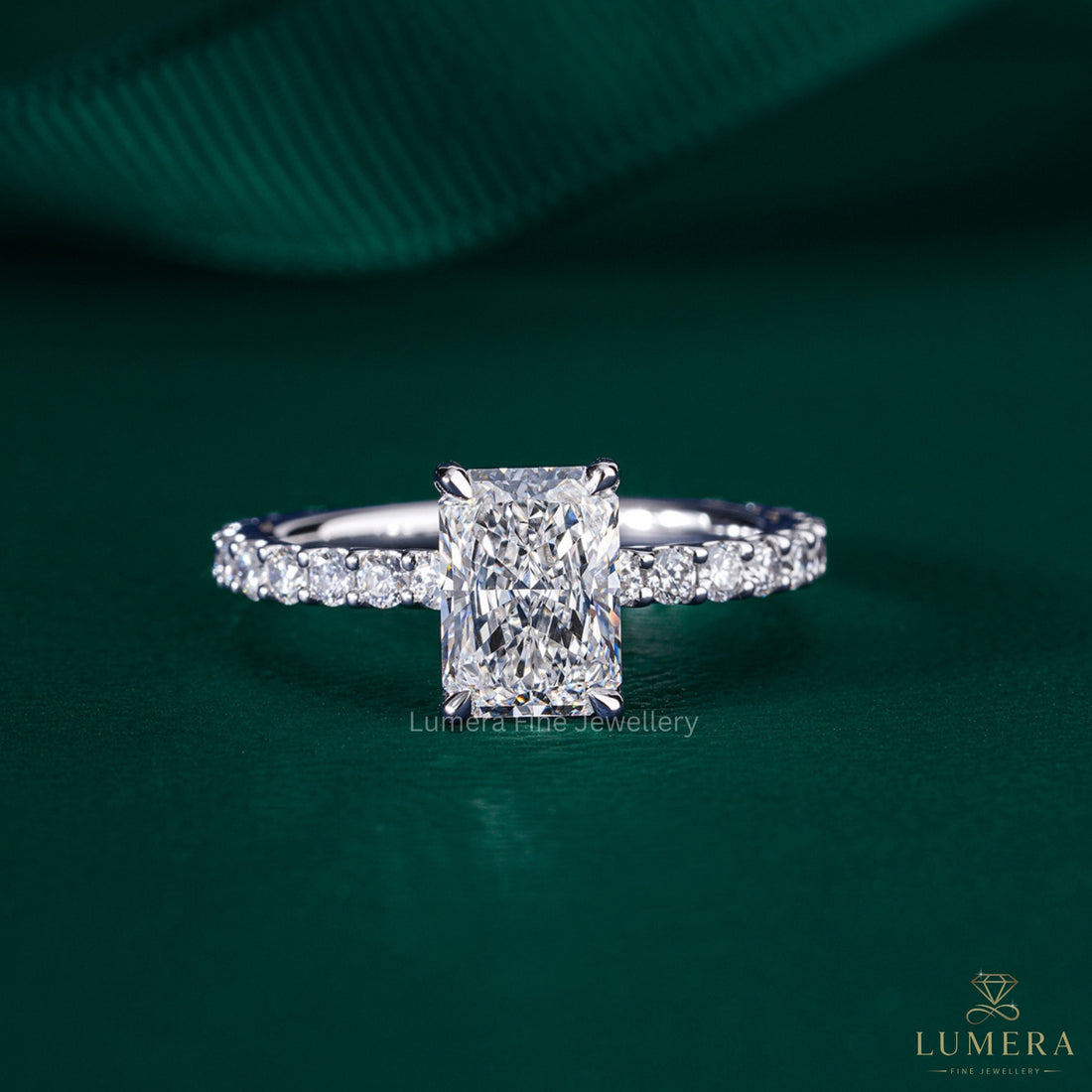 round cut pave band with 4 claw prong setting.