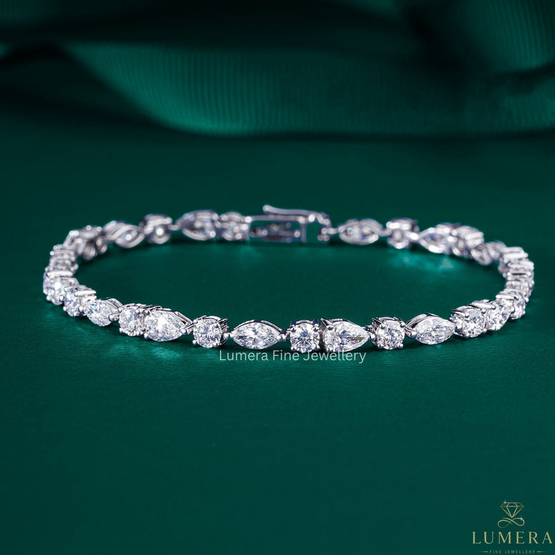 pear tennis bracelet with mixed shape diamond tennis bracelet.