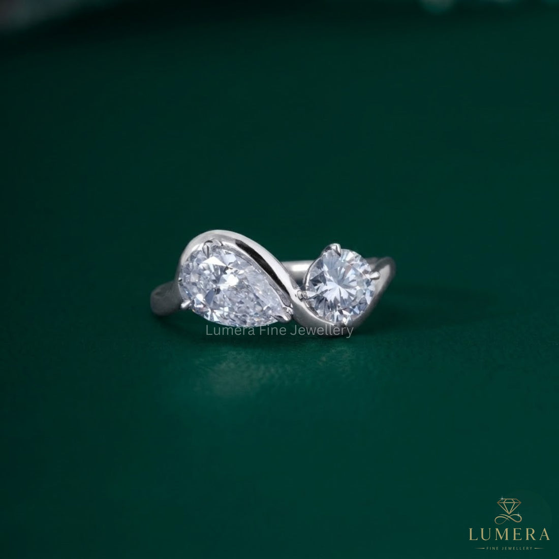 Almond and round engagement ring with Bypass toi et moi ring.